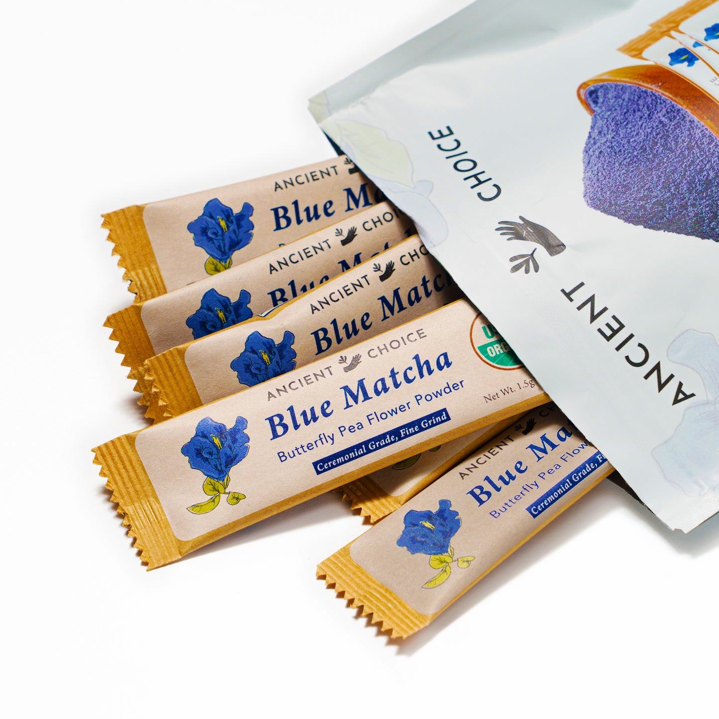 Blue Matcha Single Serve Sticks spilling from an Ancient Choice bag