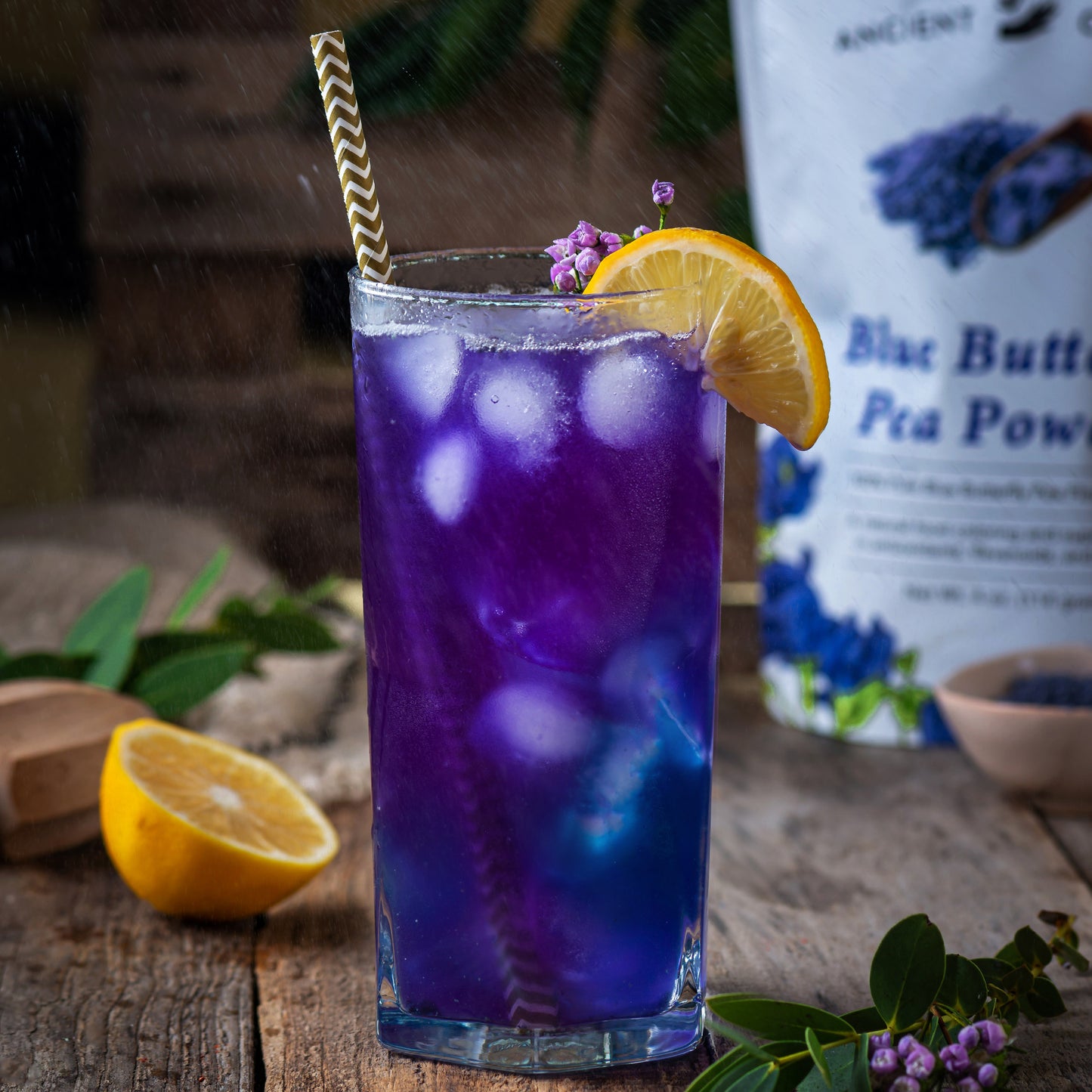 A magic lemonade made with blue matcha sticks. It is blue and turning purple.