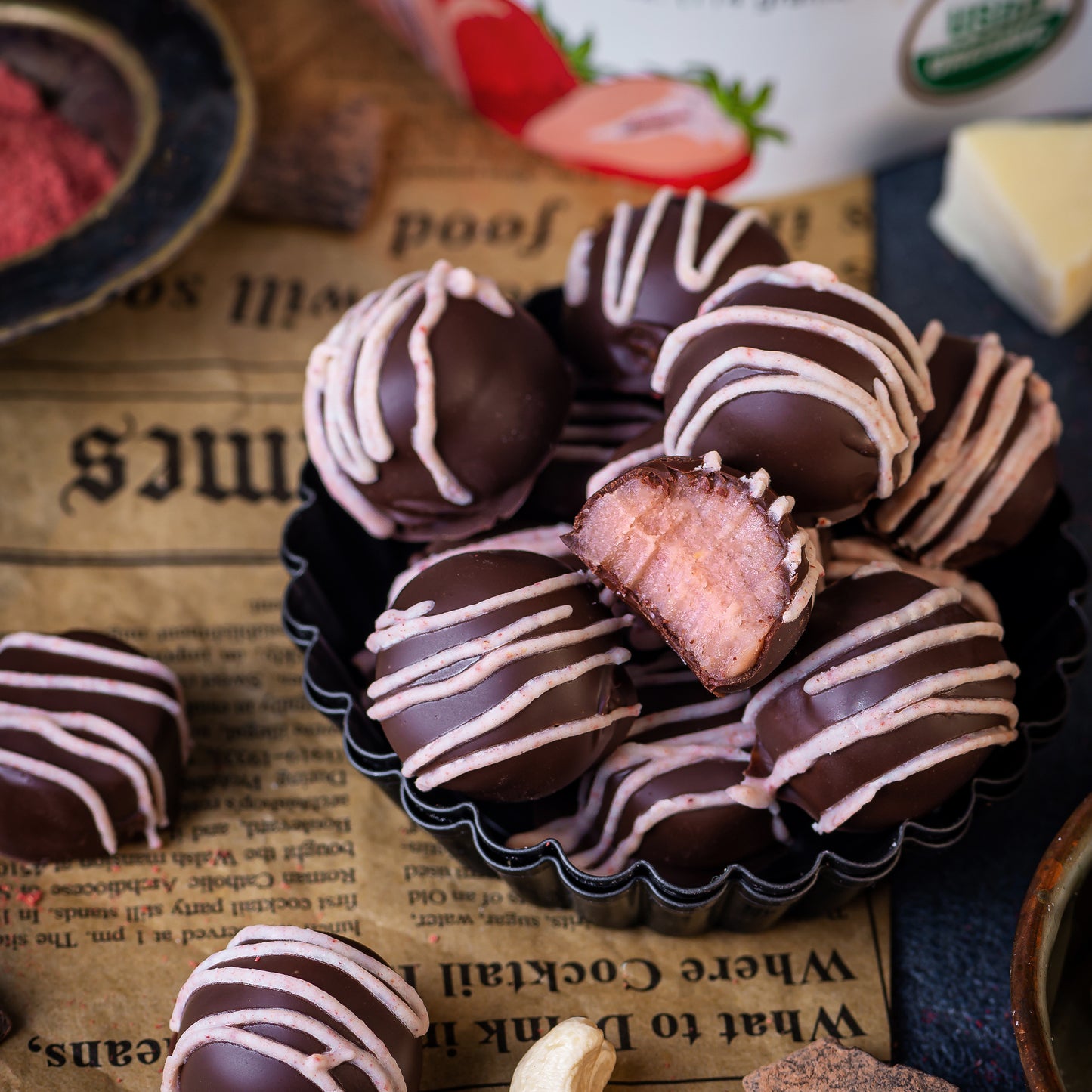 Truffles made with Ancient Choice Strawberry Powder and dipped in chocolate.